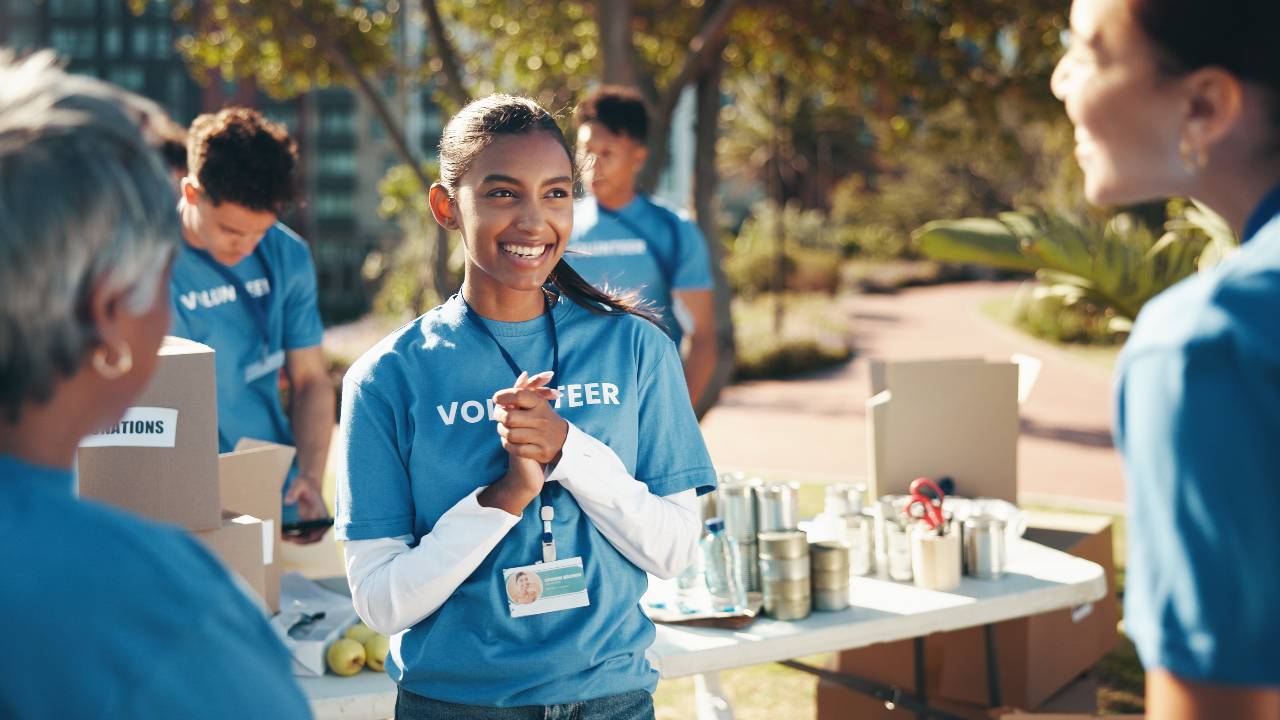 volunteer woman and charity as group for community service, project or nonprofit initiative.
